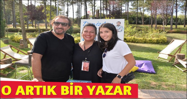 ÖNCE KİTABINI İMZALADI, SONRA YEMEKLERİN TADINA BAKTI